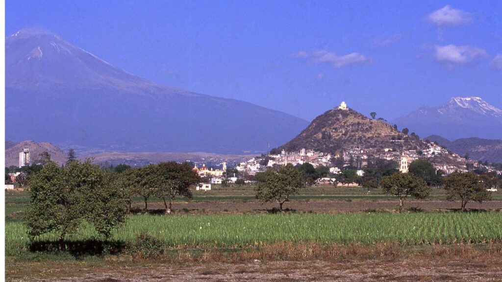 The Pyramid of Cholula and Twin Volcanos